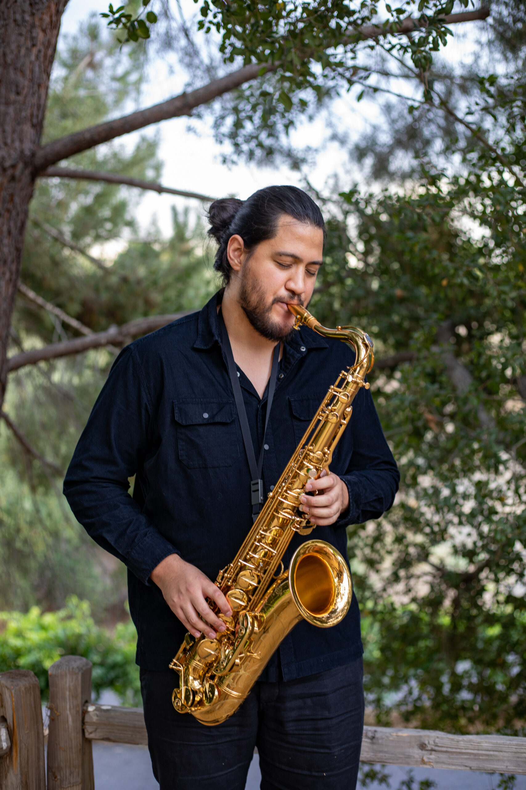man playing saxophone